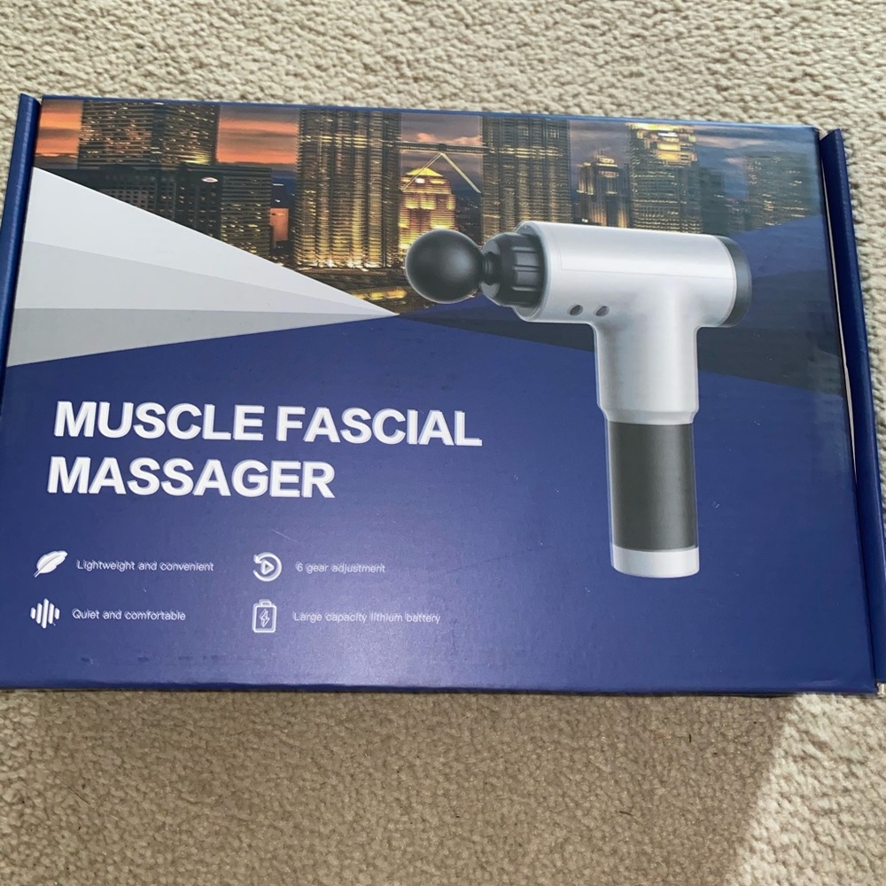 Hand held massage gun
